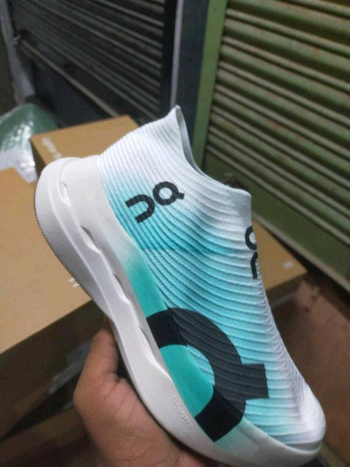 On Cloudboom Strike LS White and Mint Green